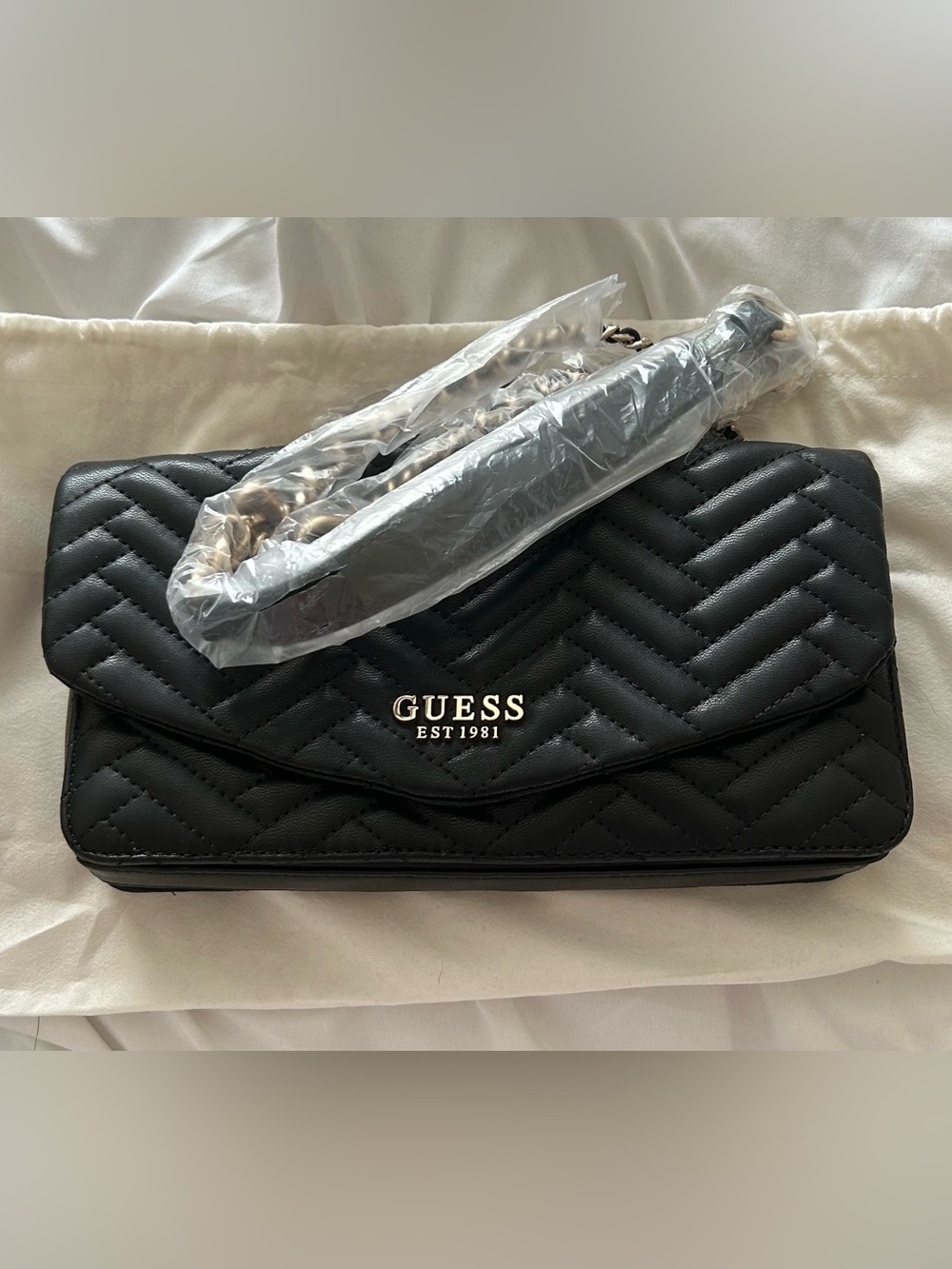 GUESS Black Quilted Crossbody Bag with Gold Logo